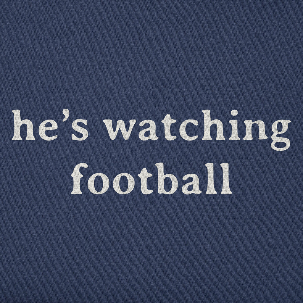 Men's He's Watching Football Short Sleeve Crusher Tee